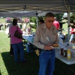 Charile Gaines enjoys a hotdog at the spook clinic