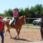 backpacker and horse